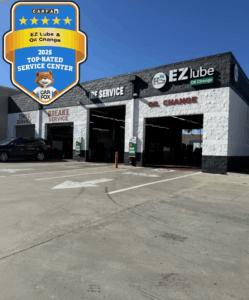 Exterior of EZ Lube & Oil Change building in Palmdale featuring the 2025 CARFAX Top-Rated Service Center award badge.