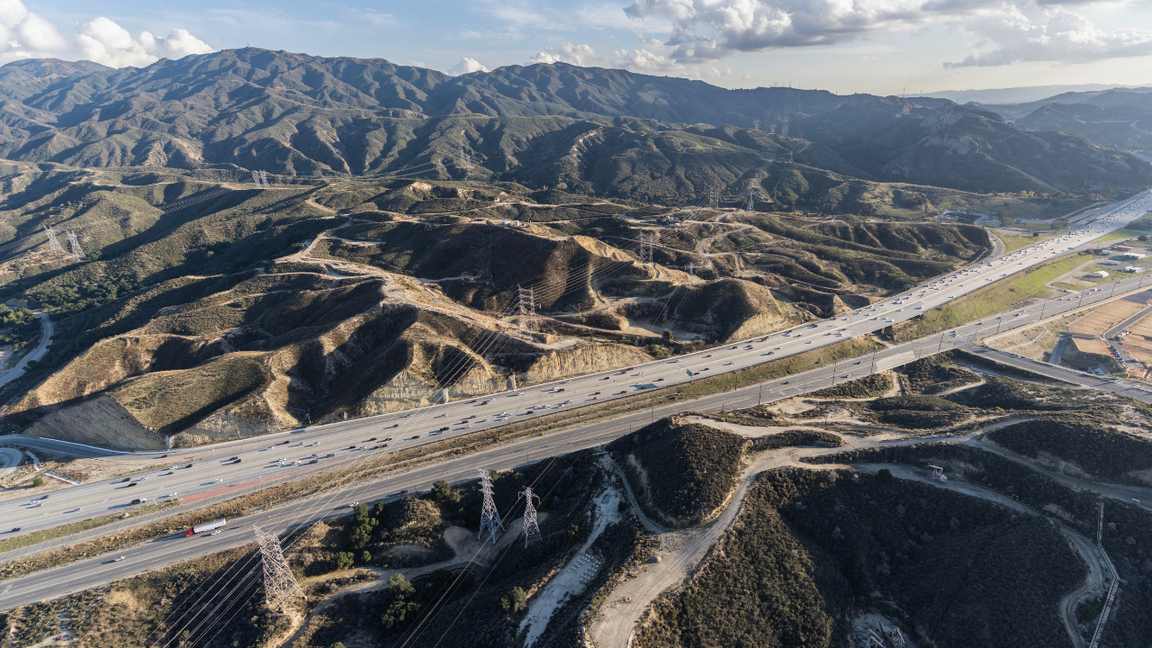 The 14 Freeway running through the Antelope Valley near Palmdale and Lancaster, California, where desert heat shortens oil life